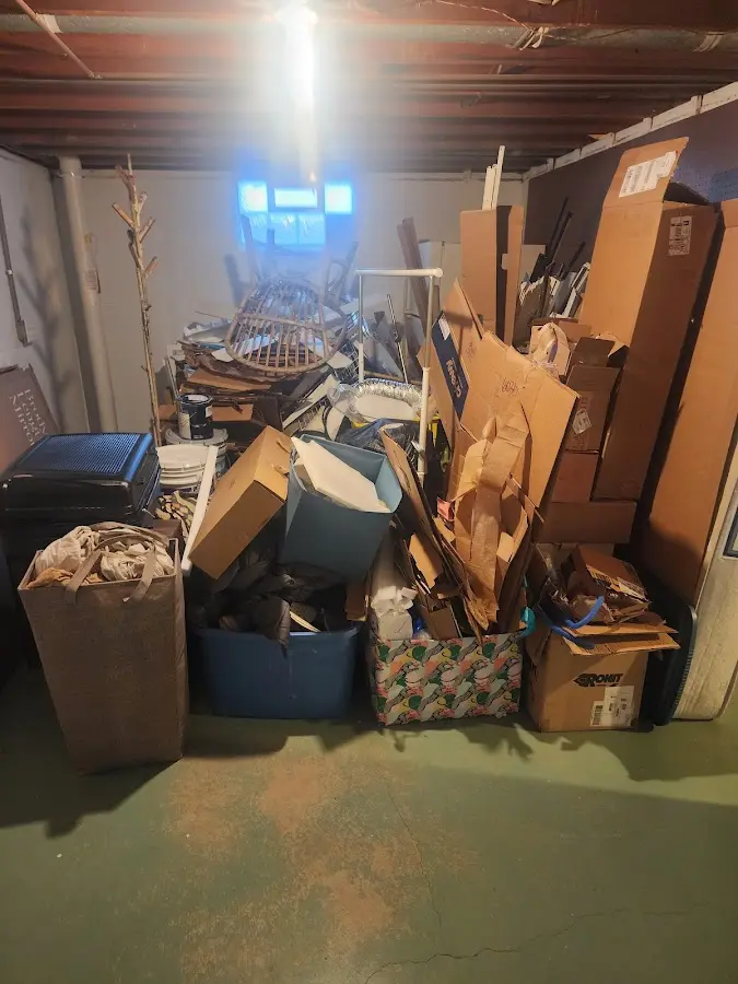 Roll-off dumpster container at job site for 15 Yard Dumpster Rental in Bethany